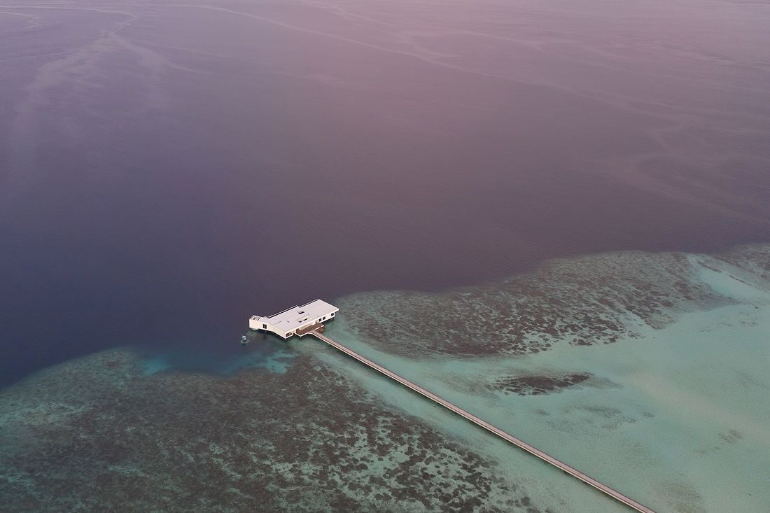 Aerial of the high end marvel which is the Muraka over water villa at the Conrad Maldives