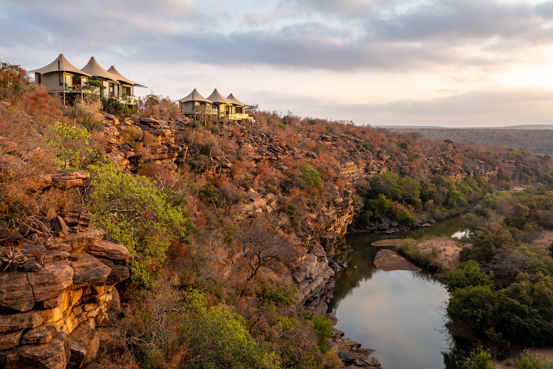 Safari sustainable villas perched on a cliff over a wildlife preserve